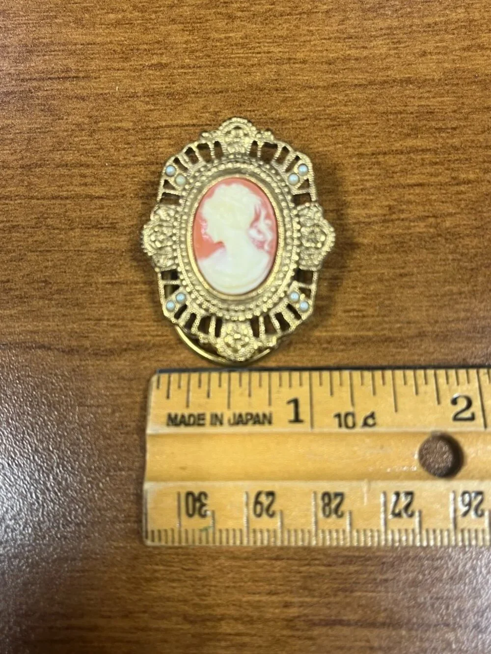 Share Vintage 1980s Cameo Scarf Clip Gold Tone Filigree Faux Pearl